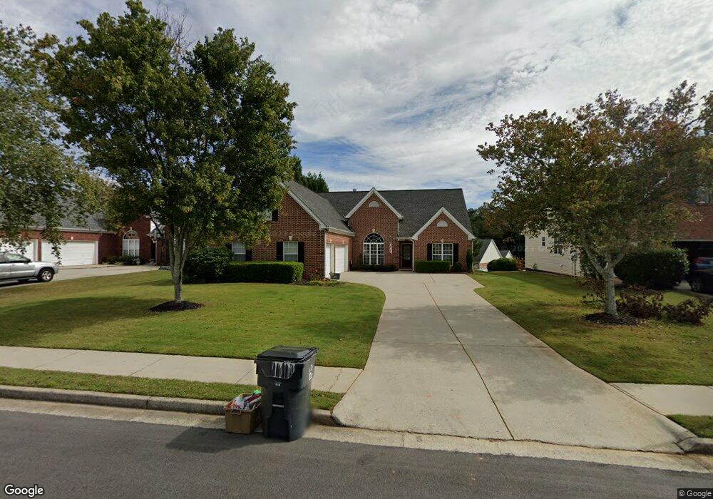 409 Grand Ashbury Ln unit 27, Buford, GA 30518 - photo 1