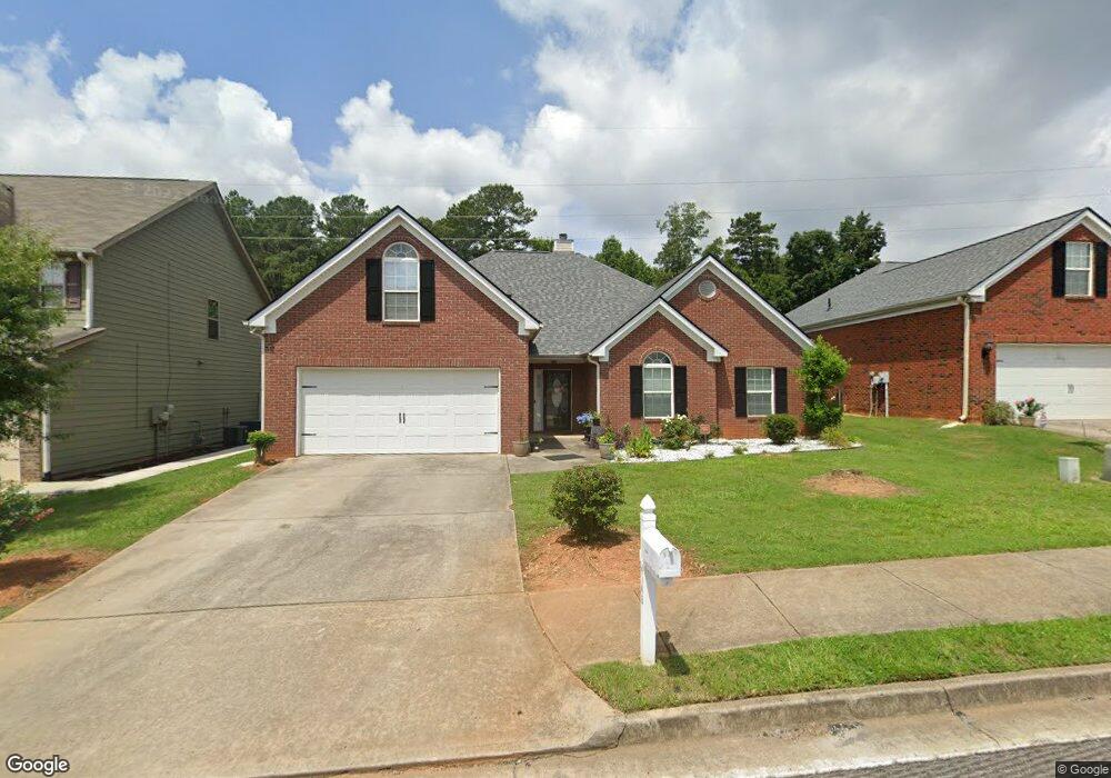 4146 Village Crossing Cir, Ellenwood, GA 30294 - photo 1