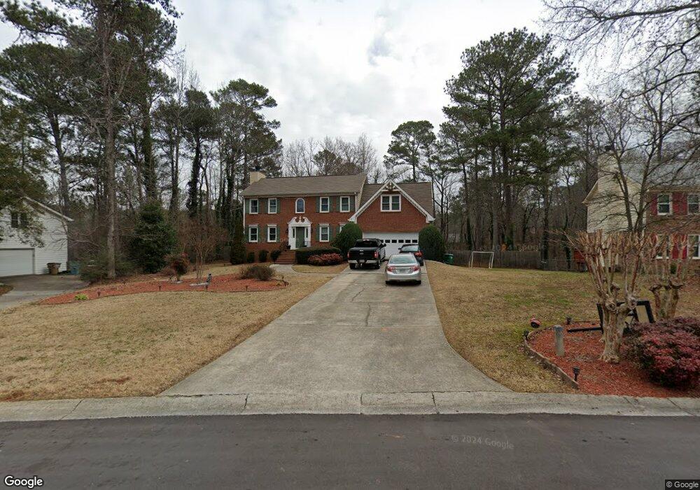 1202 Melton Dr SW, Lilburn, GA 30047 - photo 1