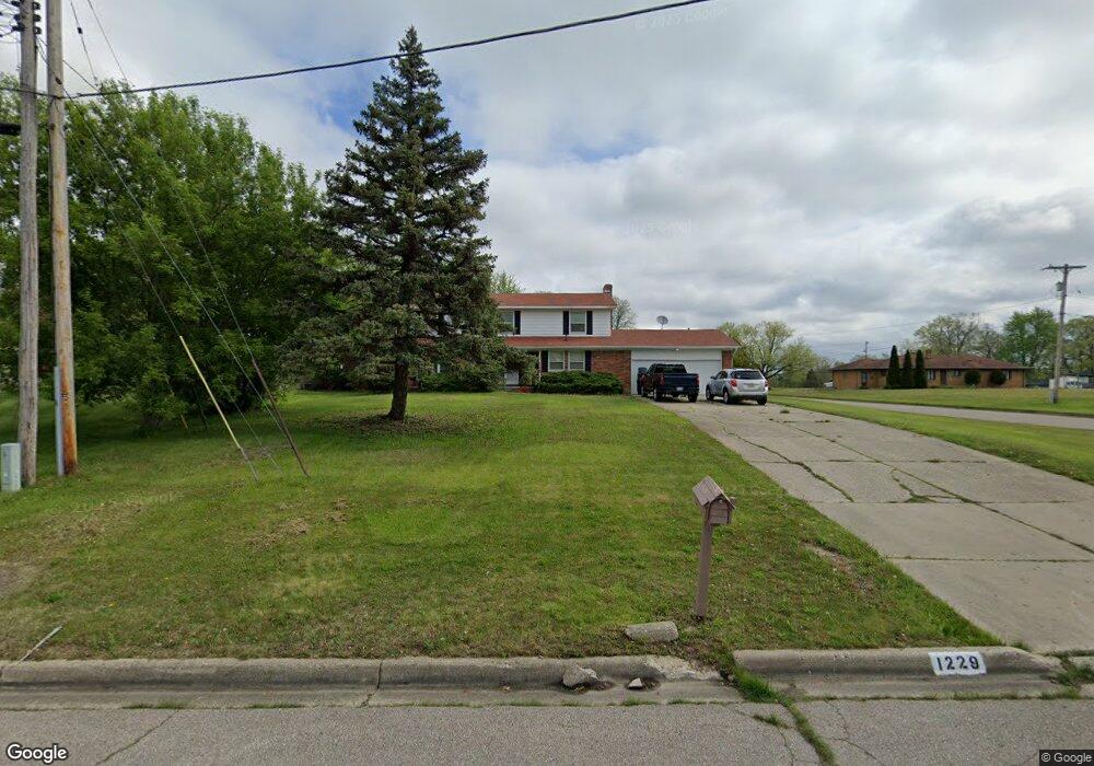 1229 Carter Dr, Flint, MI 48532 - photo 1