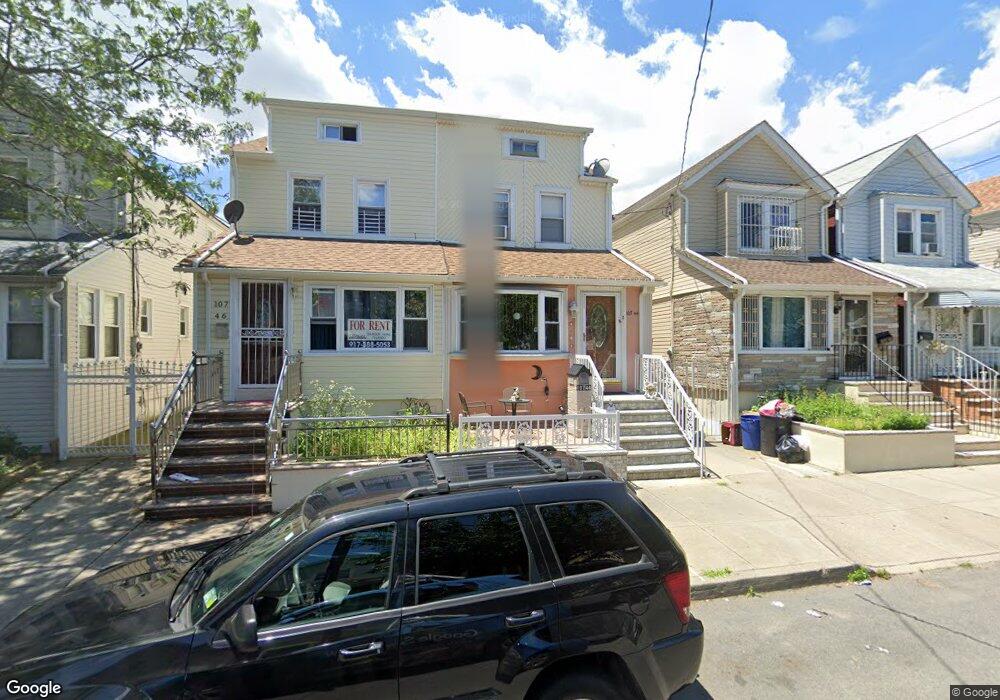 10744 88th St, Ozone Park, NY 11417 - photo 1
