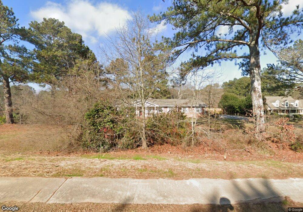 5033 Arcado Rd SW, Lilburn, GA 30047 - photo 1