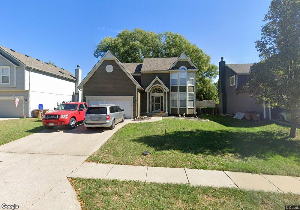 609 S Adams St, Raymore, MO 64083 - photo 1