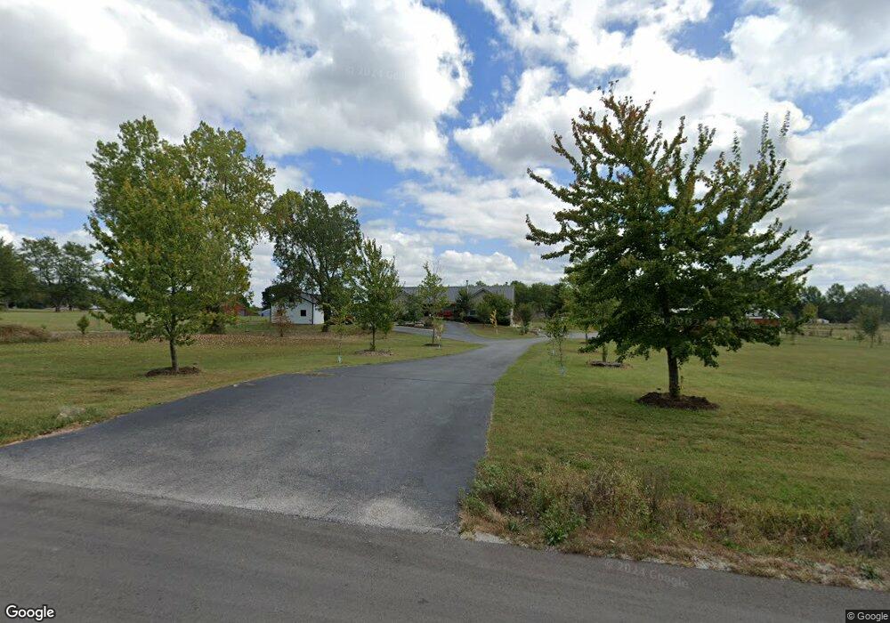 1303 N Prairie Ln, Raymore, MO 64083 - photo 1