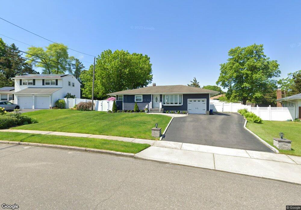 8 Eva Path, ComMacK, NY 11725 - photo 1