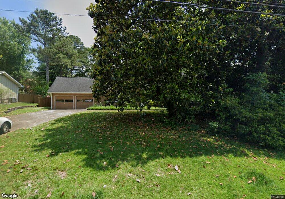 4022 Whispering Forest Ct SW, Lilburn, GA 30047 - photo 1