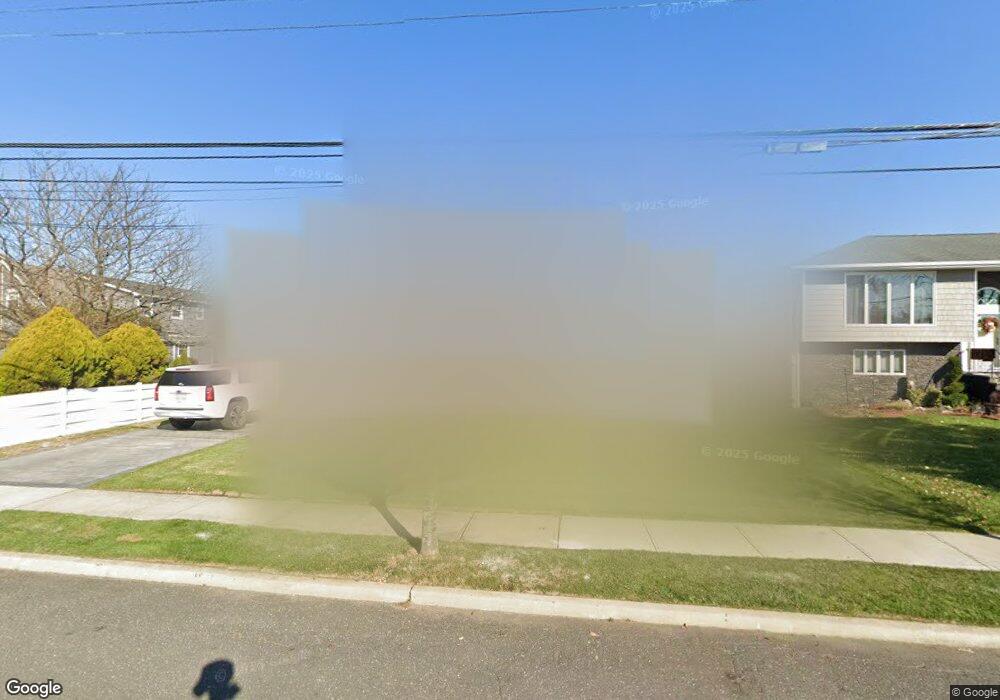 203 Trafalgar Blvd, Island Park, NY 11558 - photo 1