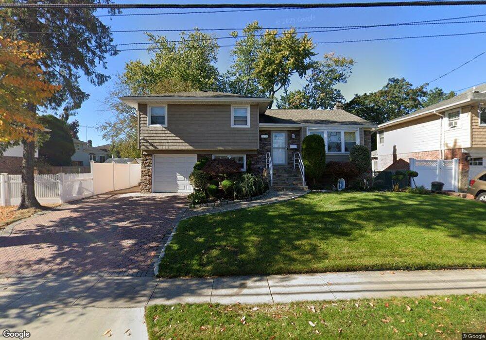 1566 Peapond Rd, North Bellmore, NY 11710 - photo 1