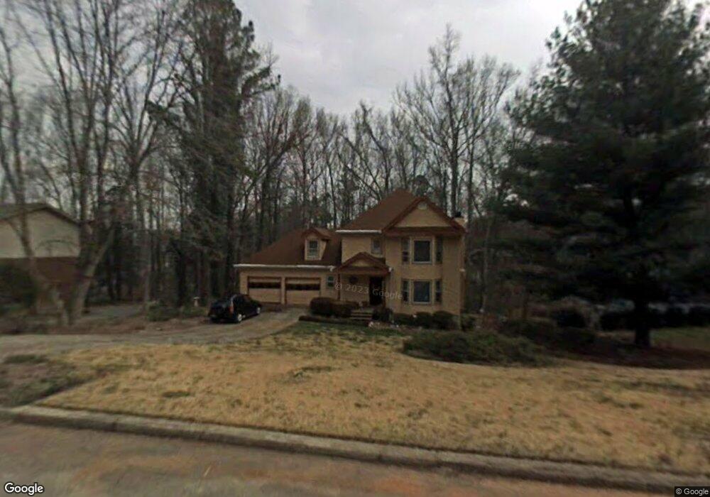 5749 Chisholm Trail SW, Lilburn, GA 30047 - photo 1