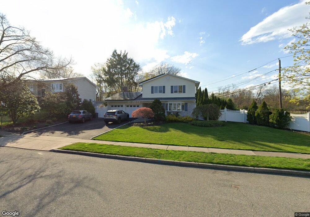 56 Marie Crescent, ComMacK, NY 11725 - photo 1