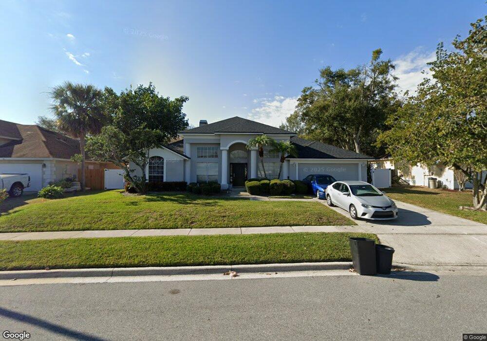 1051 Palm Cove Dr, Orlando, FL 32835 - photo 1