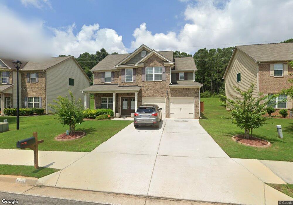 4128 Village Crossing Cir, Ellenwood, GA 30294 - photo 1
