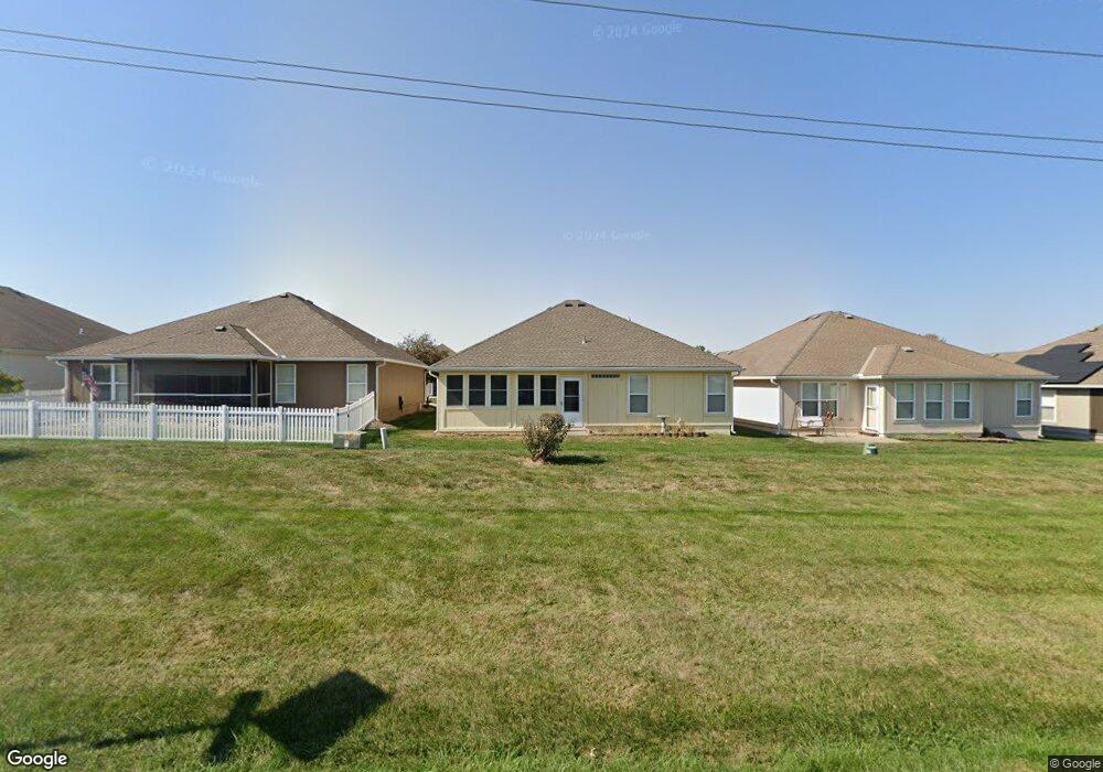 521 Neptune Dr, Raymore, MO 64083 - photo 1