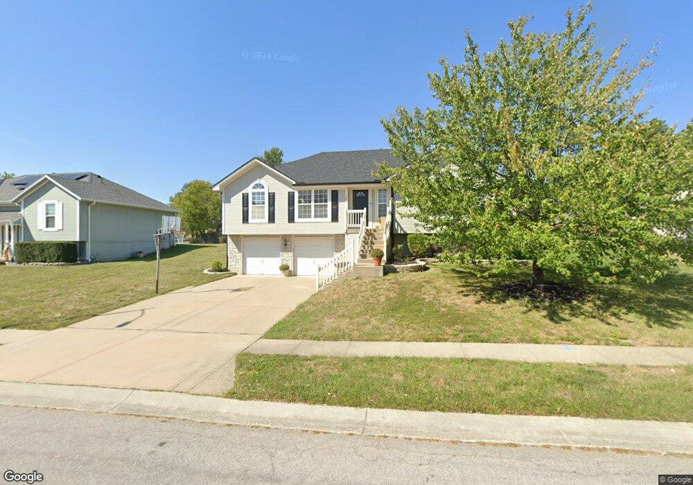 406 N Franklin St, Raymore, MO 64083 - photo 1