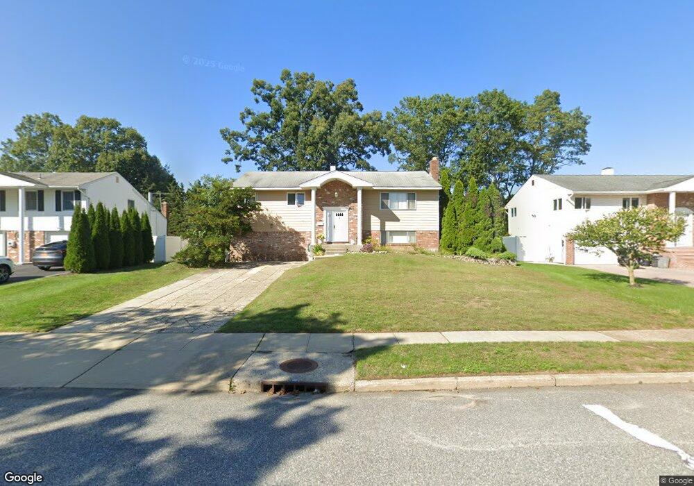 25 Chatham Rd, ComMacK, NY 11725 - photo 1