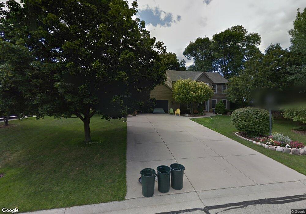 W148N10175 Windsong Cir E, Germantown, WI 53022 - photo 1