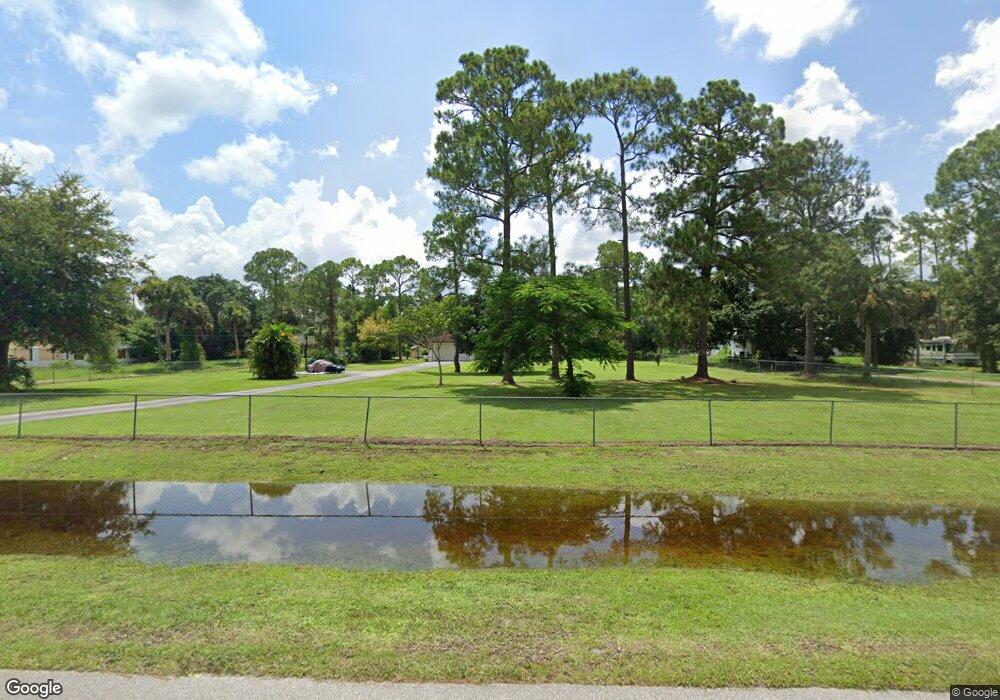 1411 17th St SW, Naples, FL 34117 - photo 1