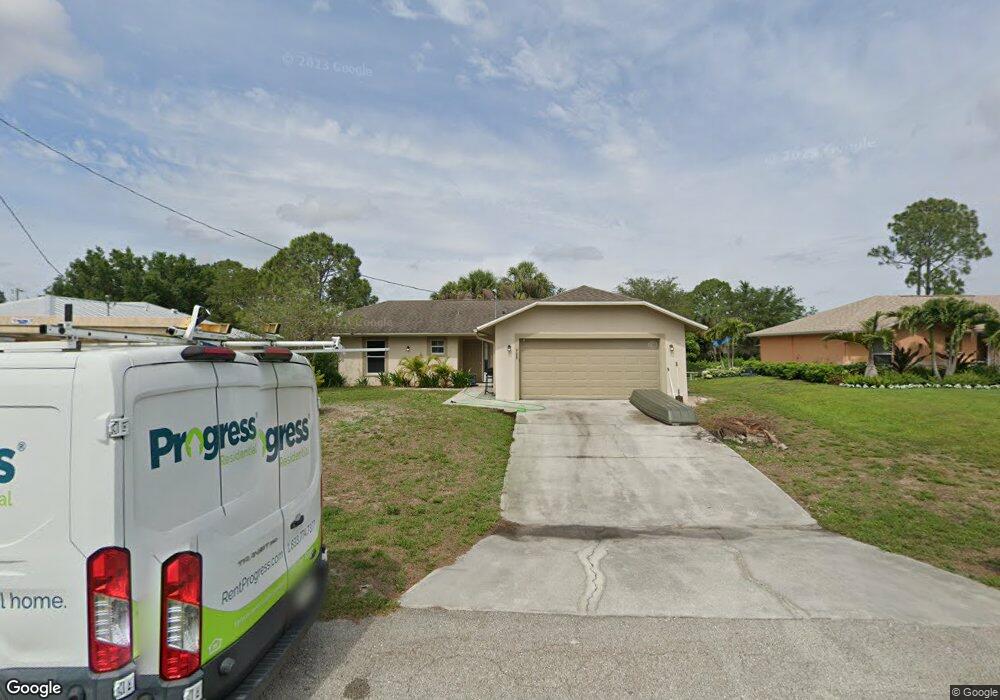 908 Naples Ave S, Lehigh Acres, FL 33974 - photo 1