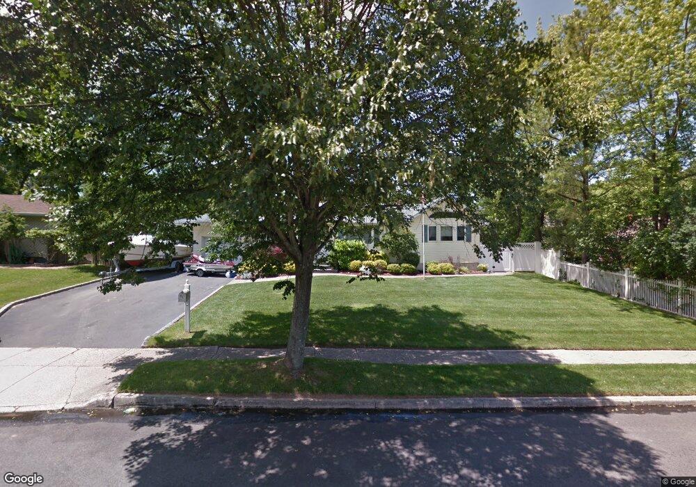 10 Abbey Dr, ComMacK, NY 11725 - photo 1