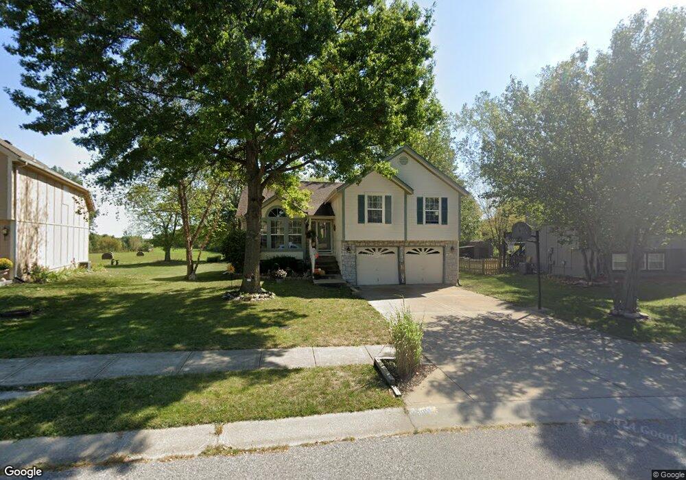 409 N Crest Dr, Raymore, MO 64083 - photo 1