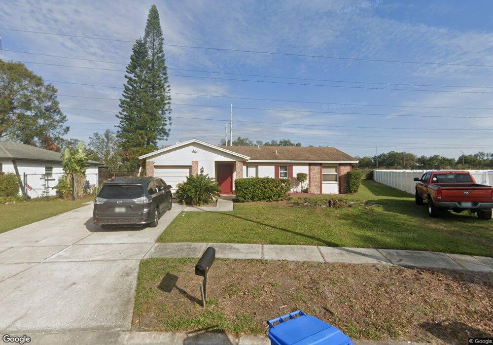 8616 Wood Ridge Rd, Tampa, FL 33619 - photo 1