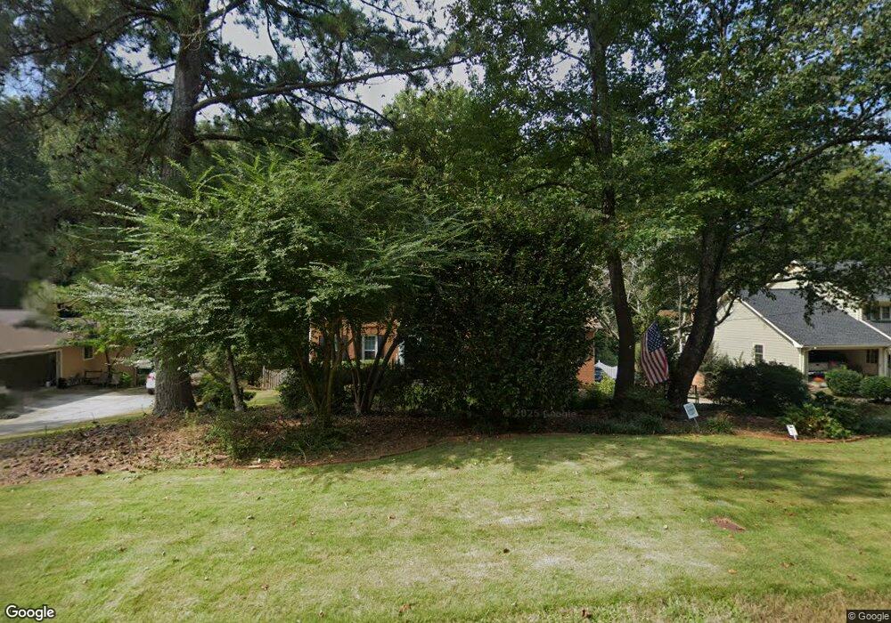 401 Cardigan Cir SW, Lilburn, GA 30047 - photo 1