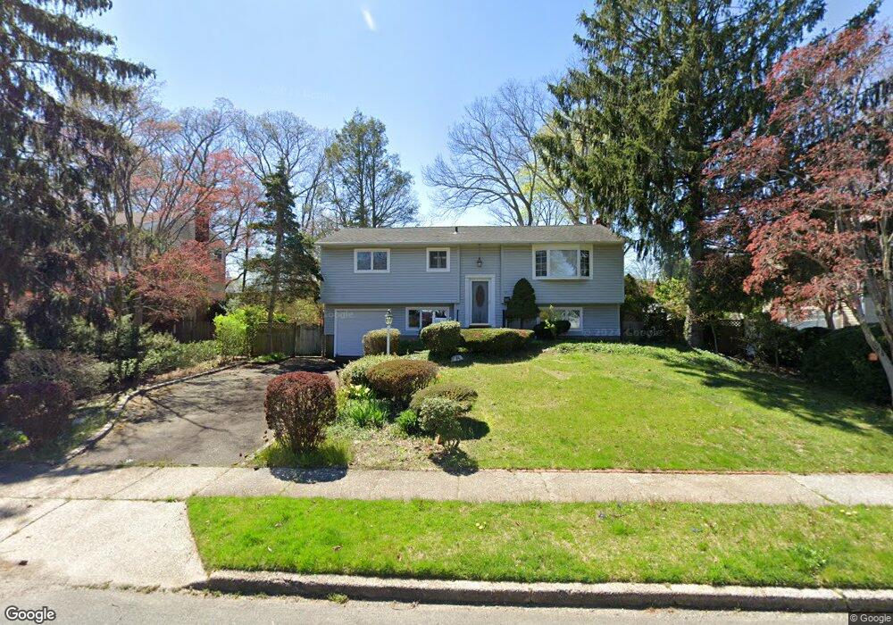 24 Bethany Dr, ComMacK, NY 11725 - photo 1