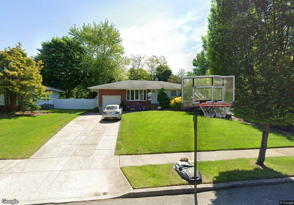 75 Marie Crescent, ComMacK, NY 11725 - photo 1