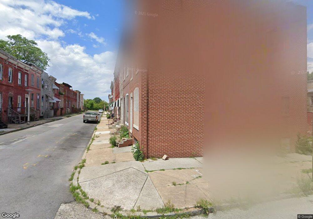 303 N Bruce St, Baltimore, MD 21223 - photo 1
