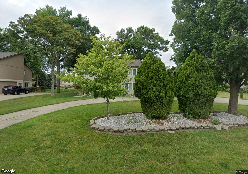 4957 W Pond Cir, West Bloomfield, MI 48323 - photo 1