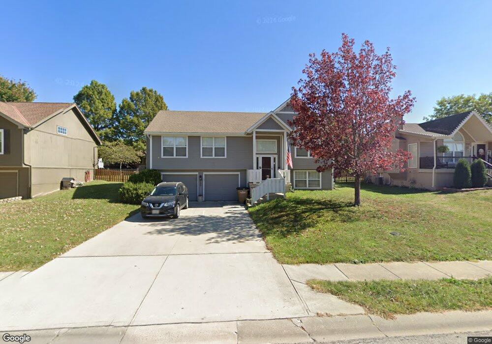 709 Canter St, Raymore, MO 64083 - photo 1