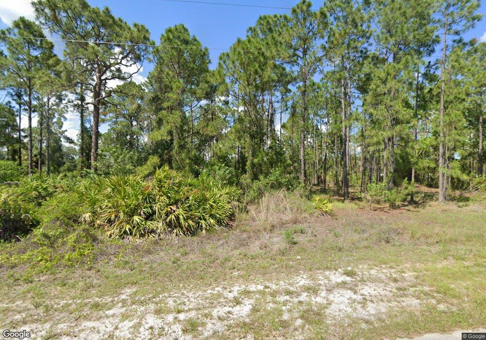 415 Harshaw St, Lehigh Acres, FL 33974 - photo 1