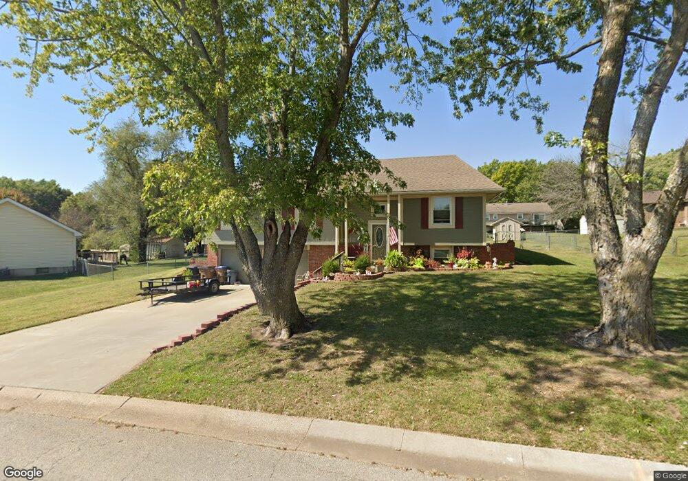 404 N Adams St, Raymore, MO 64083 - photo 1