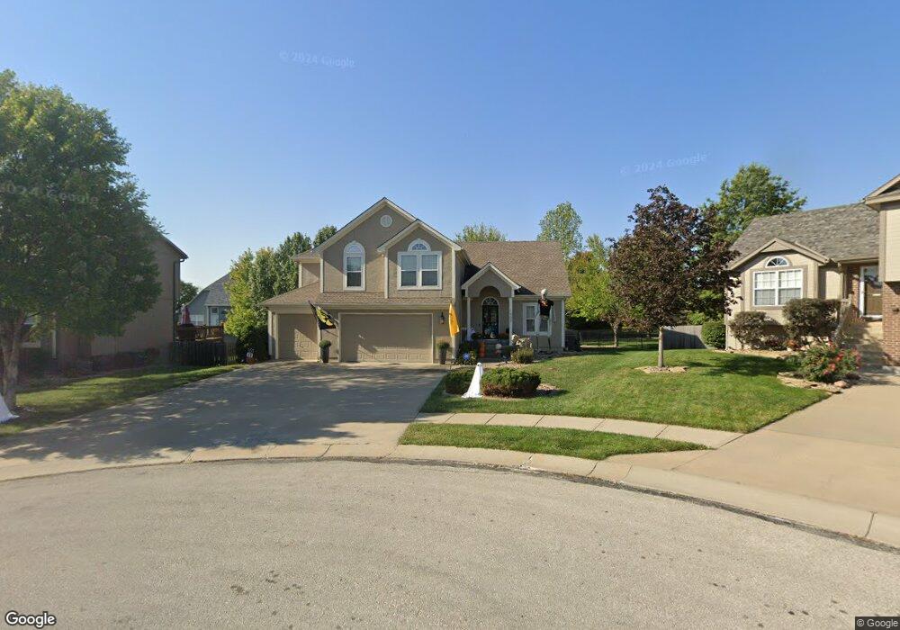 1507 Enlsey Cir, Raymore, MO 64083 - photo 1