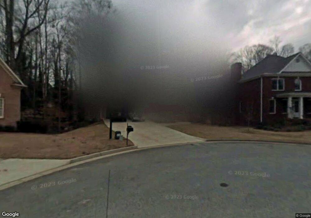 105 Harmony Point Cove, Lilburn, GA 30047 - photo 1