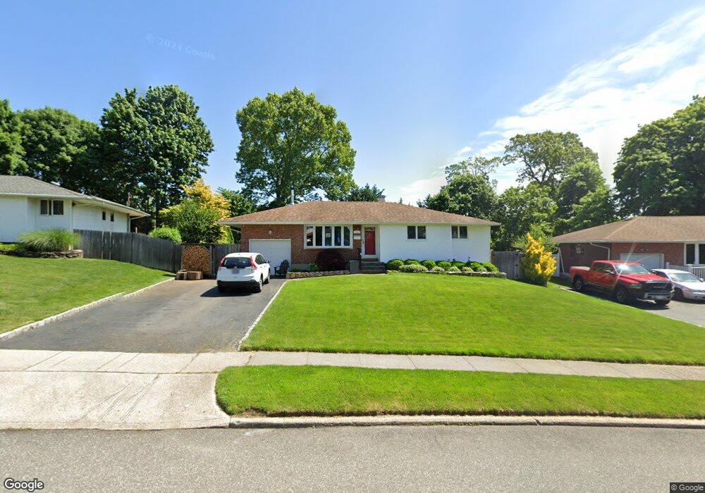 9 Rita Crescent, ComMacK, NY 11725 - photo 1