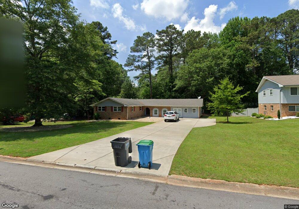 4041 Whispering Forest Ct SW, Lilburn, GA 30047 - photo 1