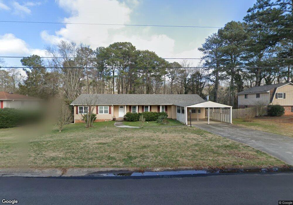 340 Village Green Ct SW, Lilburn, GA 30047 - photo 1