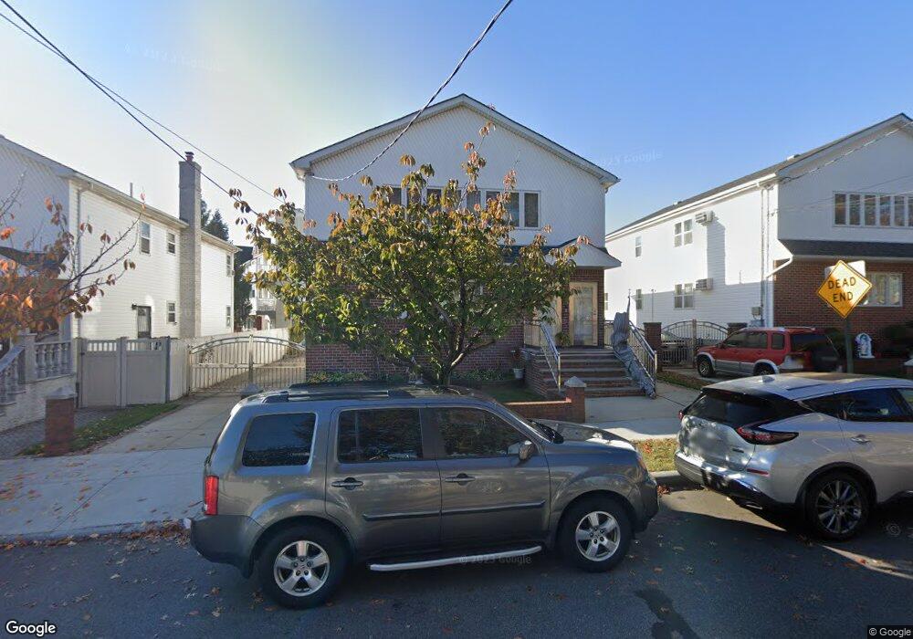 9324 Albert Rd, Ozone Park, NY 11417 - photo 1