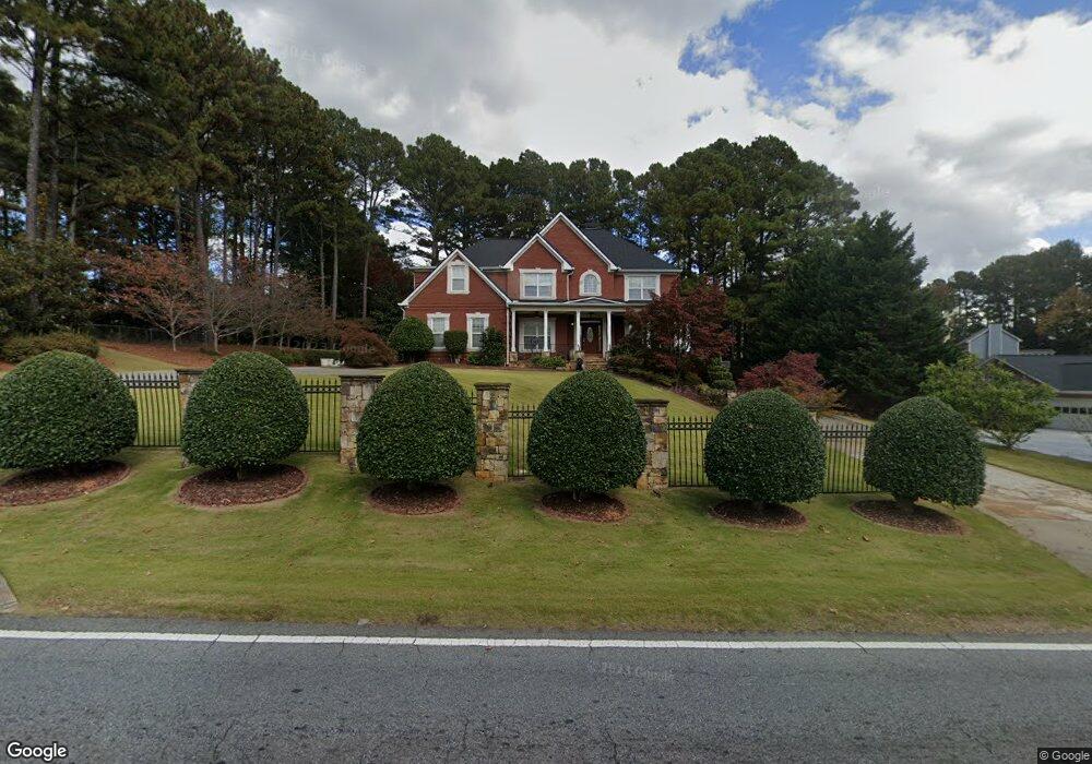 1306 Oak Rd SW, Lilburn, GA 30047 - photo 1