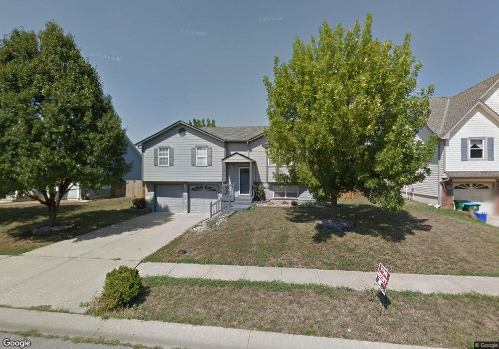 206 W Laredo Trail, Raymore, MO 64083 - photo 1