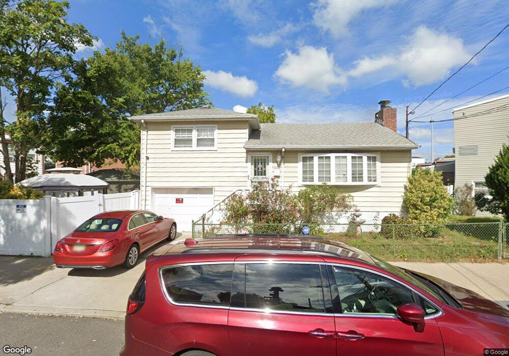 8225 97th Ave, Ozone Park, NY 11416 - photo 1