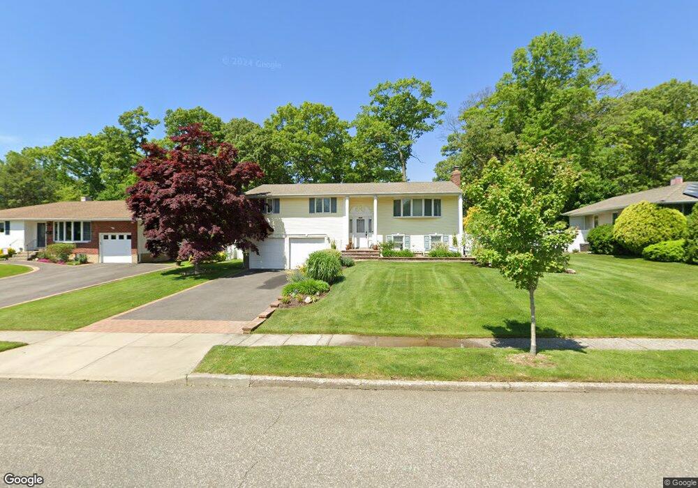 90 Marie Crescent, ComMacK, NY 11725 - photo 1