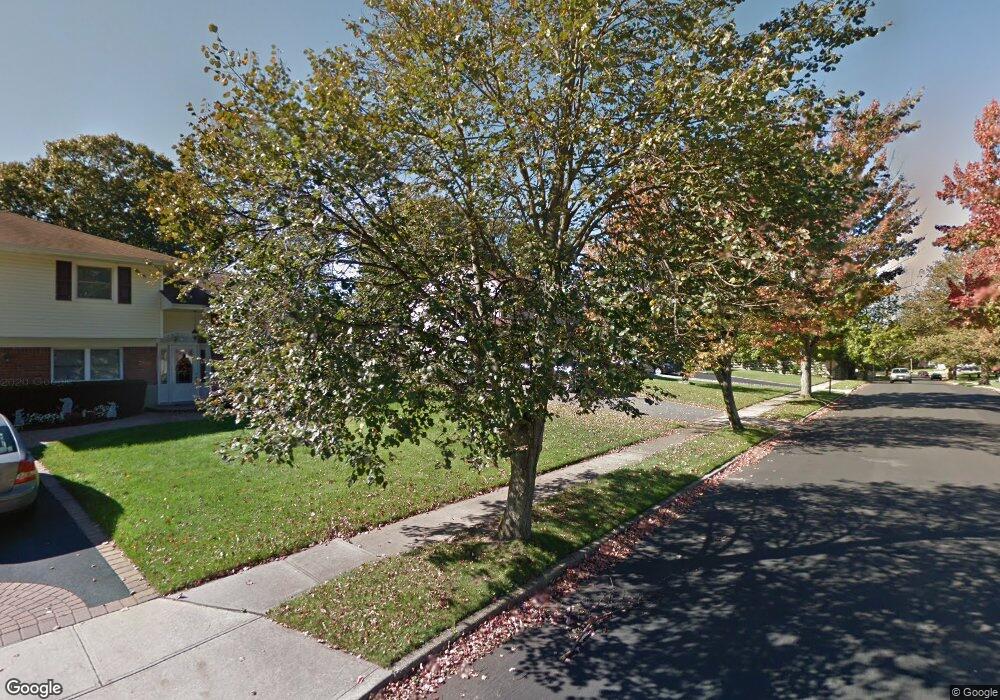 50 Genesee Dr, ComMacK, NY 11725 - photo 1