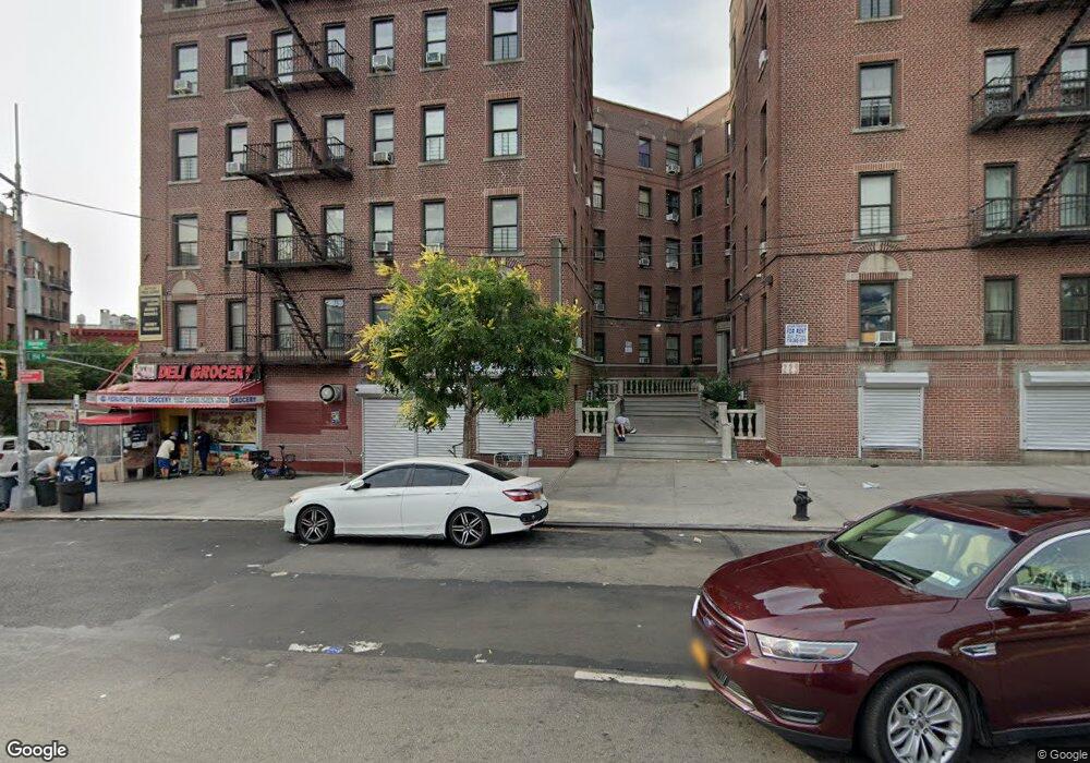 229 E Kingsbridge Rd, Bronx, NY 10458 - photo 1