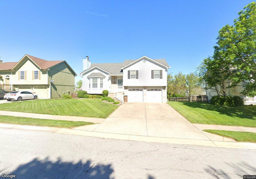 303 S Pelham Path, Raymore, MO 64083 - photo 1