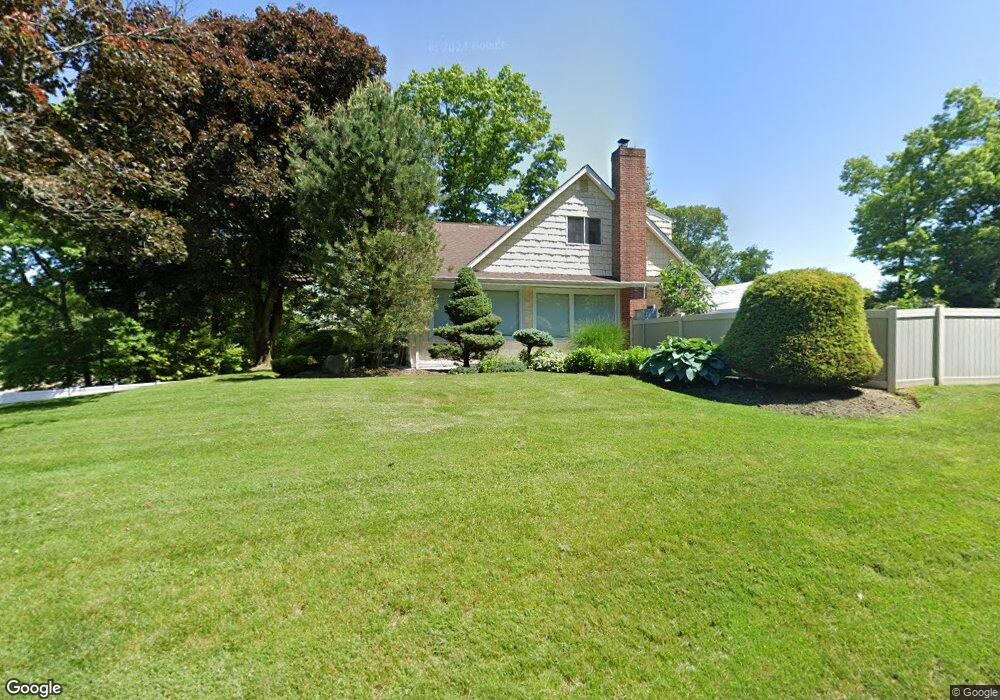 379 Harned Rd, ComMacK, NY 11725 - photo 1