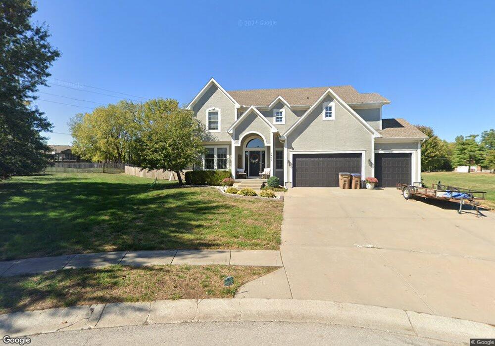 1408 Cedar Ridge Cir, Raymore, MO 64083 - photo 1