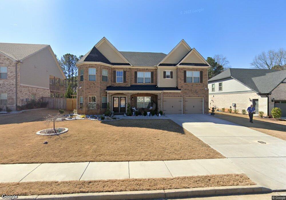 5240 Woodland Pass Cir, Stone Mountain, GA 30087 - photo 1