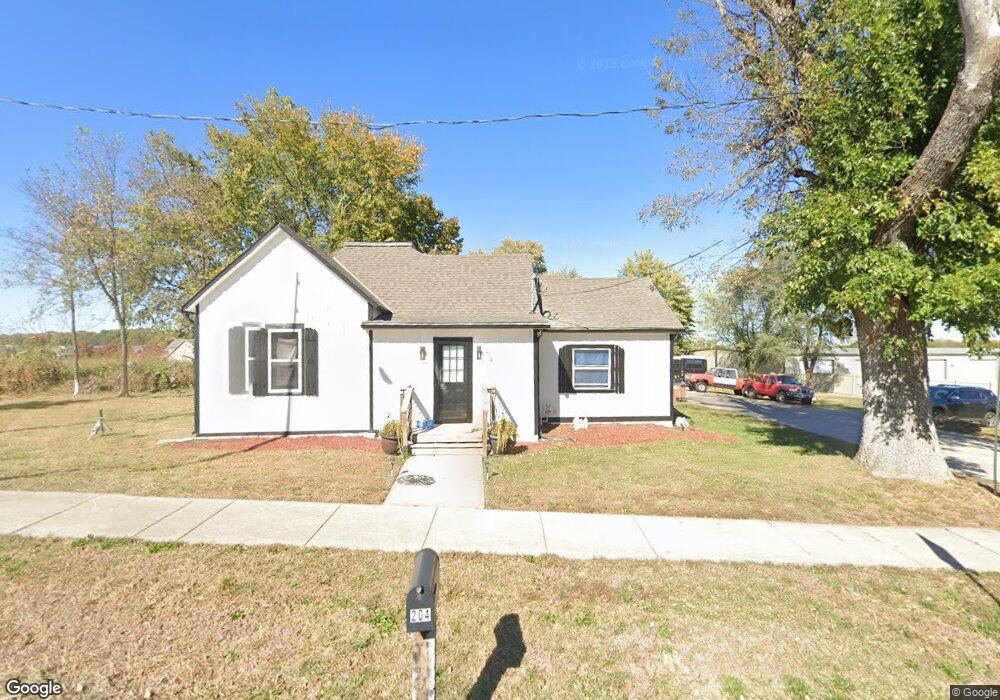 210 E Walnut St, Raymore, MO 64083 - photo 1